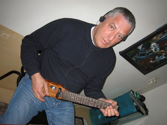 M. Hasveldt with Lapstick travel guitar